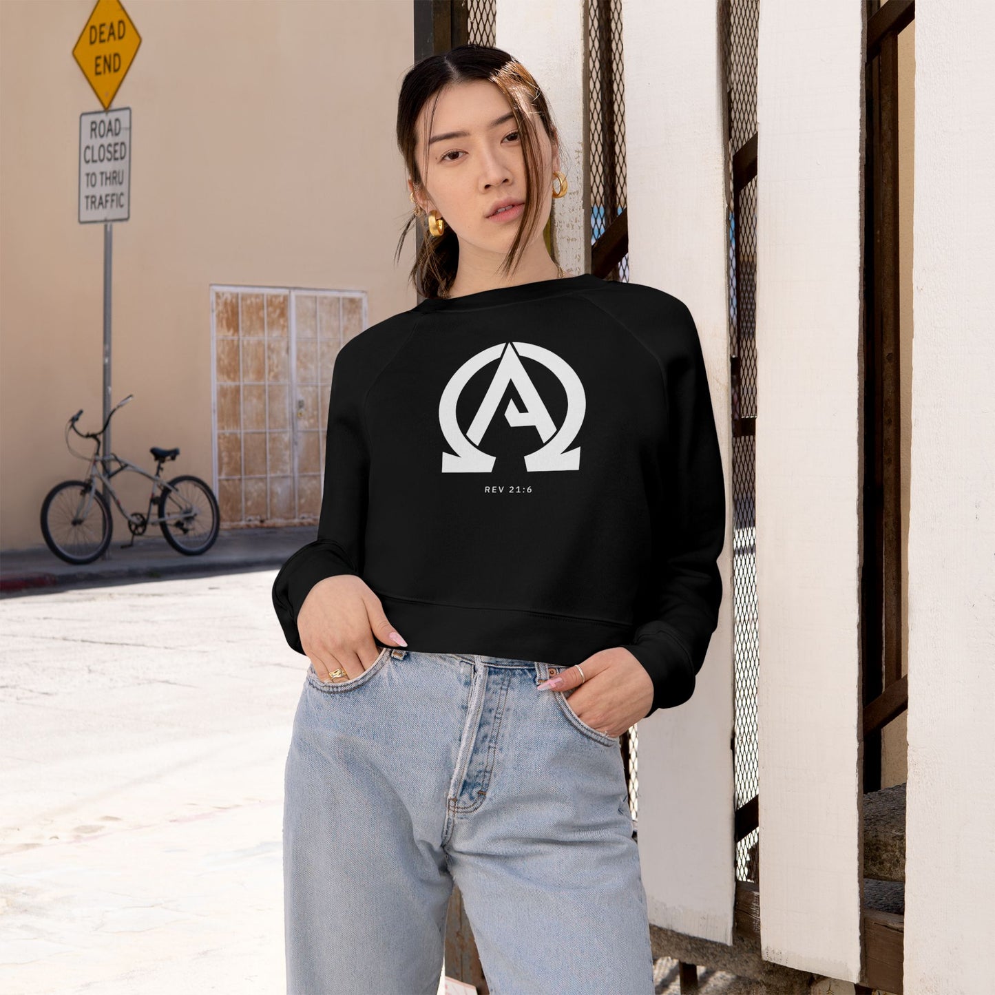 Women's "Alpha Omega" cropped sweatshirt with Rev. 21:6 print, where God calls Himself the "Alpha and Omega," meaning the beginning and the end.