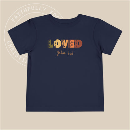 Toddler "Loved" Tee John 3:16 highlights God's love, shown through His sacrifice of Jesus Christ, granting eternal life to all who believe.