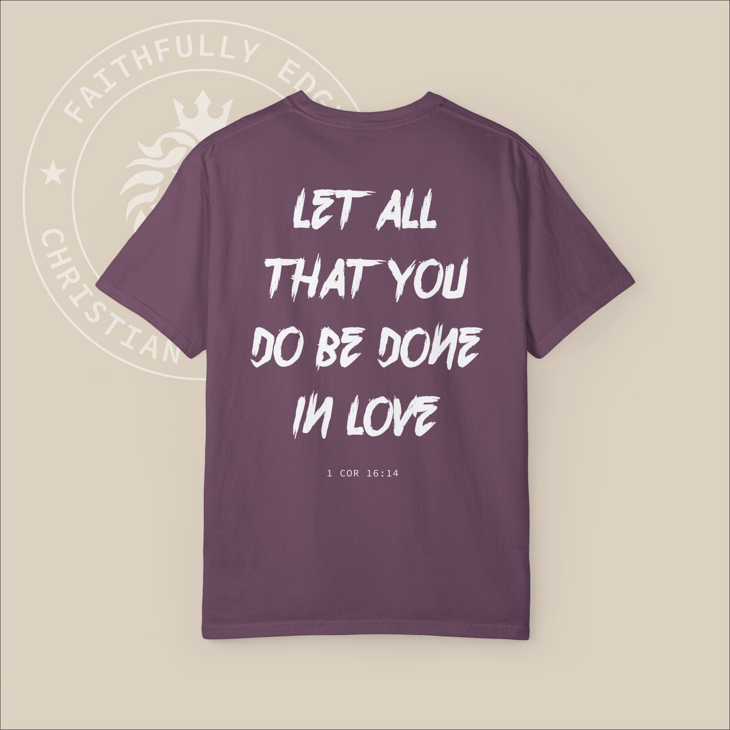 Purple unisex t-shirt with white "Let all that you do be done in love" back print. 