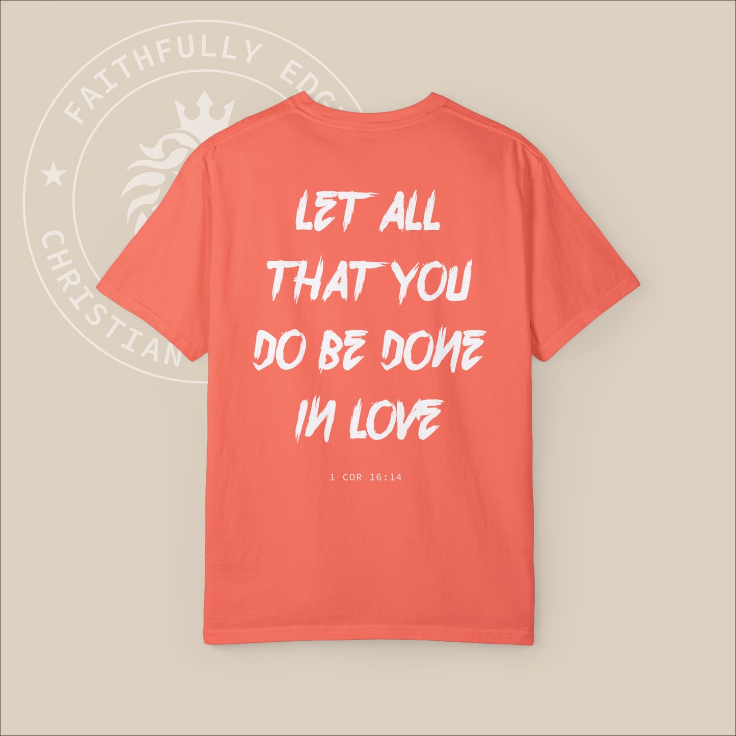 Orange unisex t-shirt with white "Let all that you do be done in love" back print. 