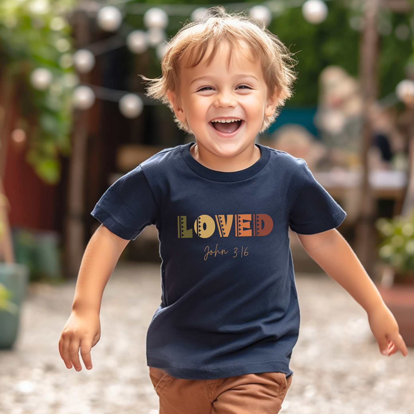 Toddler "Loved" Tee John 3:16 highlights God's love, shown through His sacrifice of Jesus Christ, granting eternal life to all who believe.